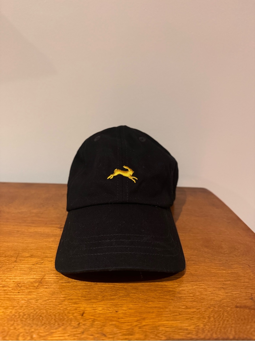 Black Tracksmith  Cap with Gold Jumping Hare Embroidery